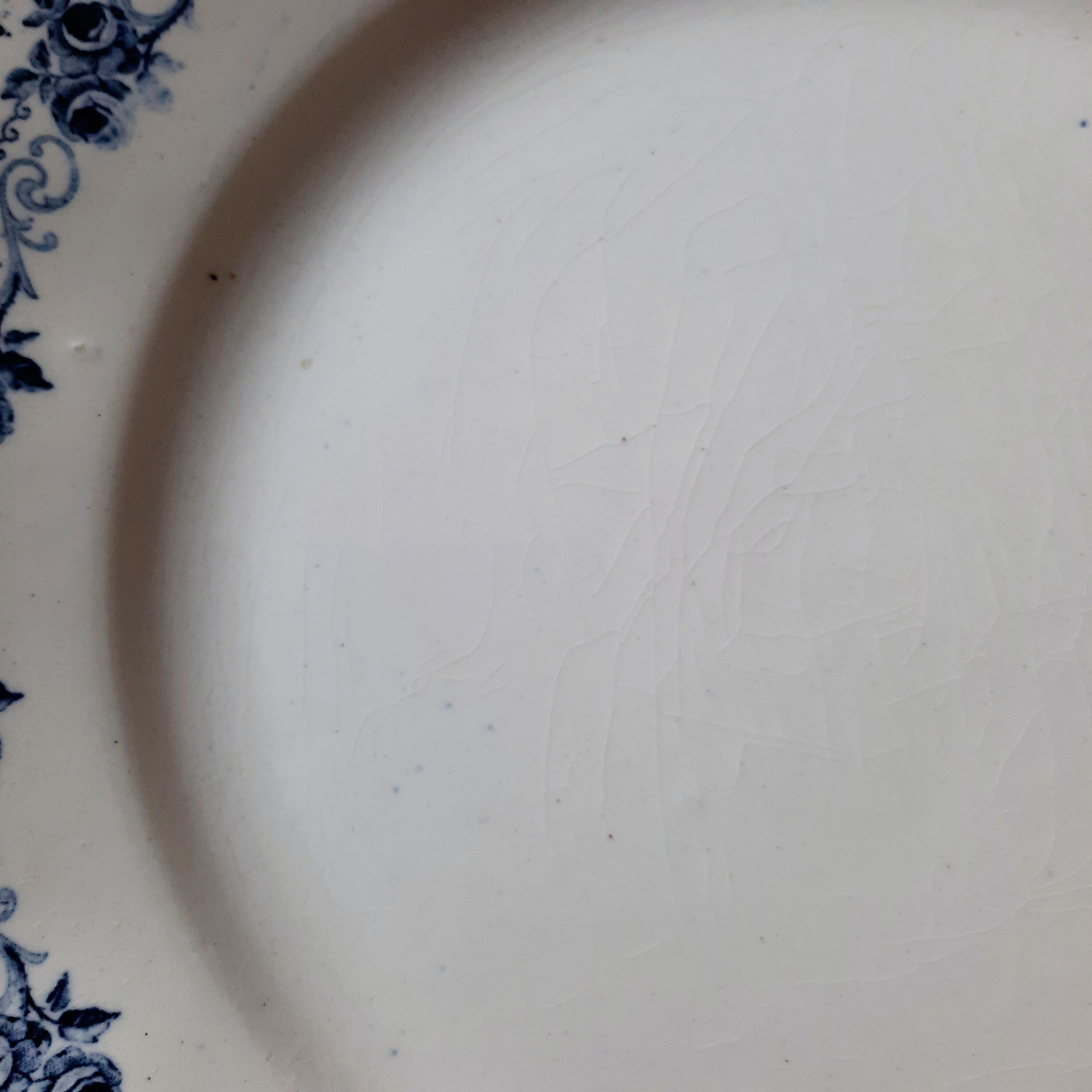 Old flat plates mismatched in earthenware