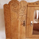 Art-deco wall showcase in raw oak