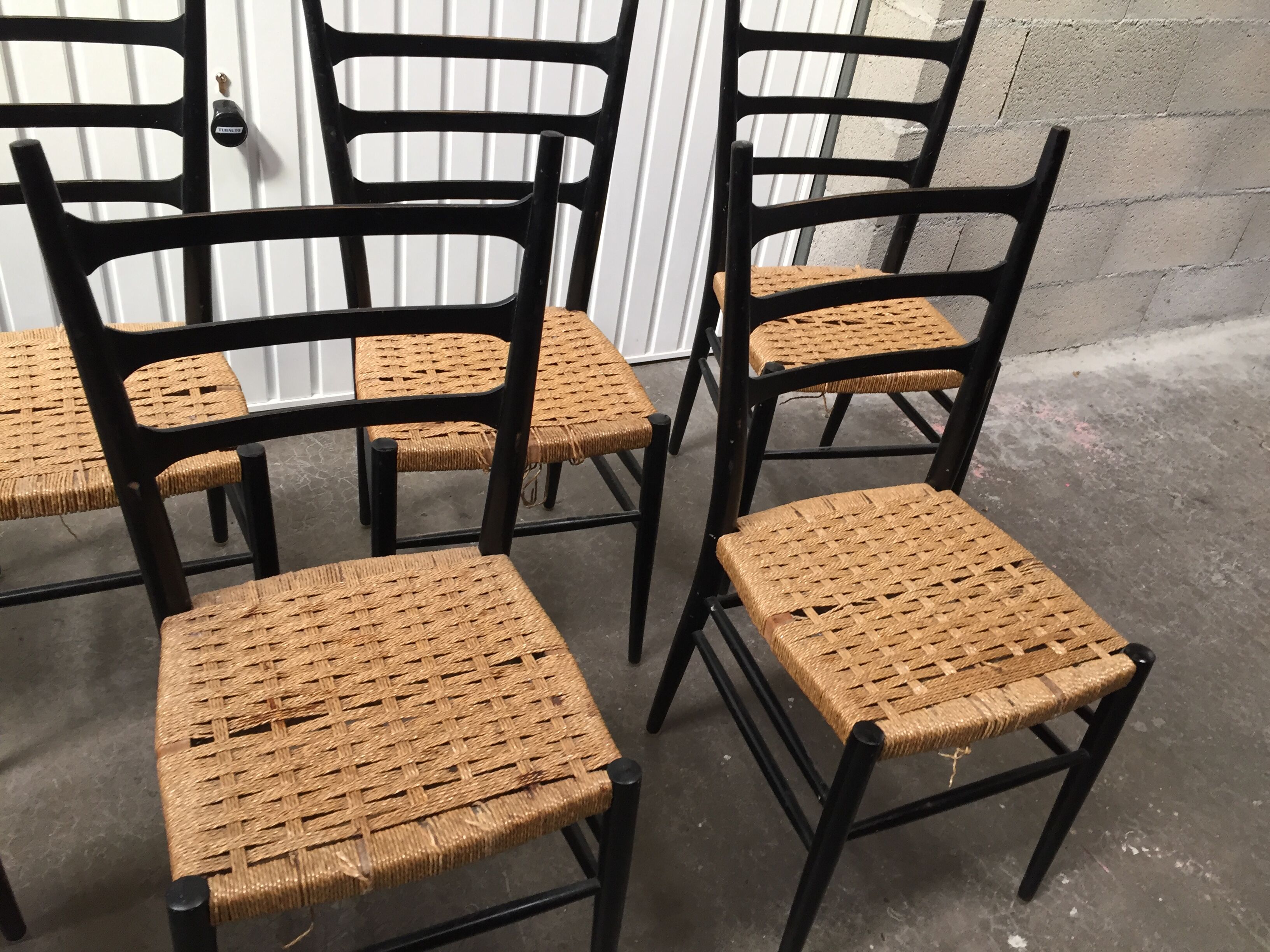 Set of 7 blackened wooden chairs, 1960s vintage