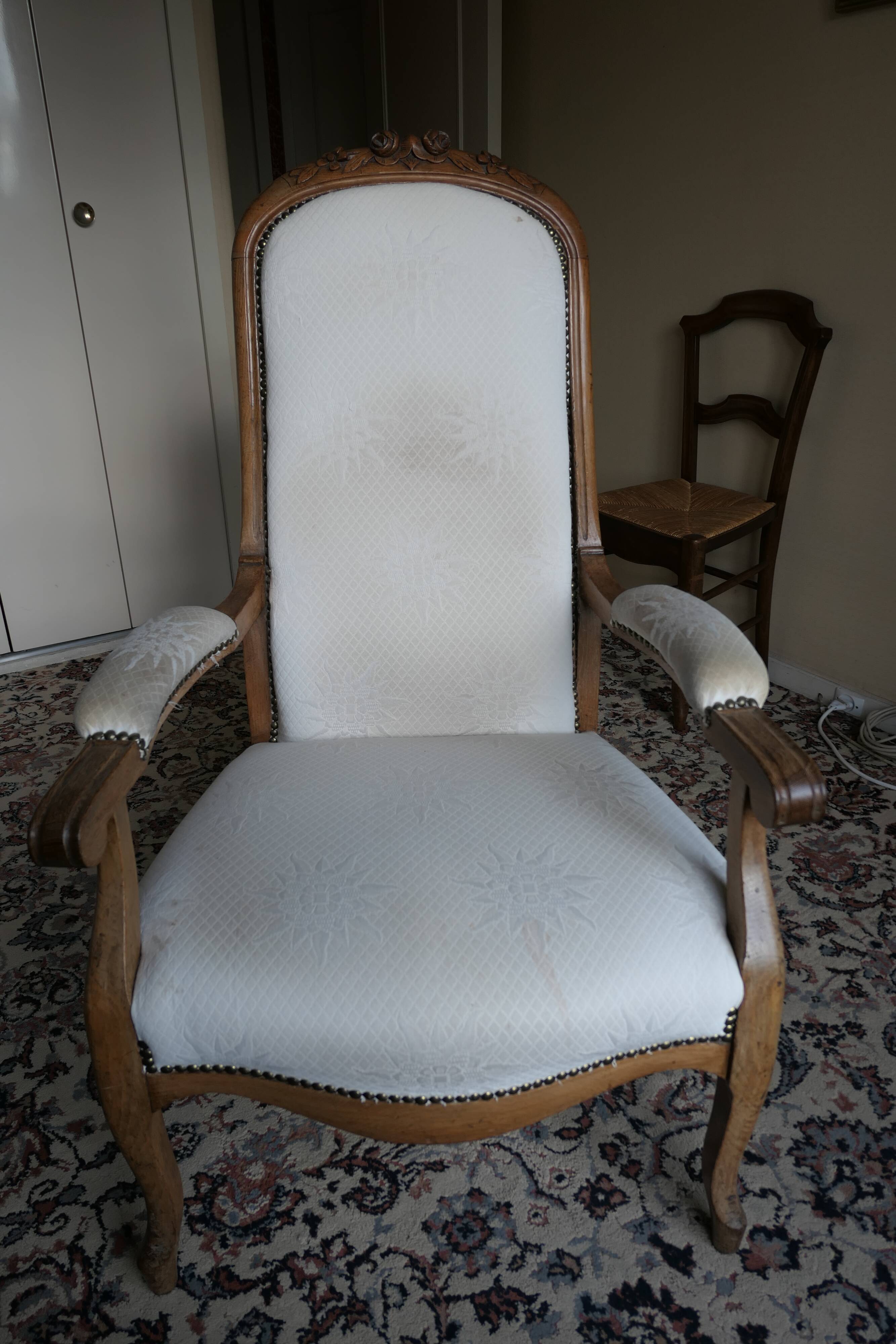 Pair of antique Voltaire armchairs, carved back