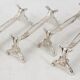 Christofle Chrysanthème, 4 silver-plated knife rests, excellent condition.