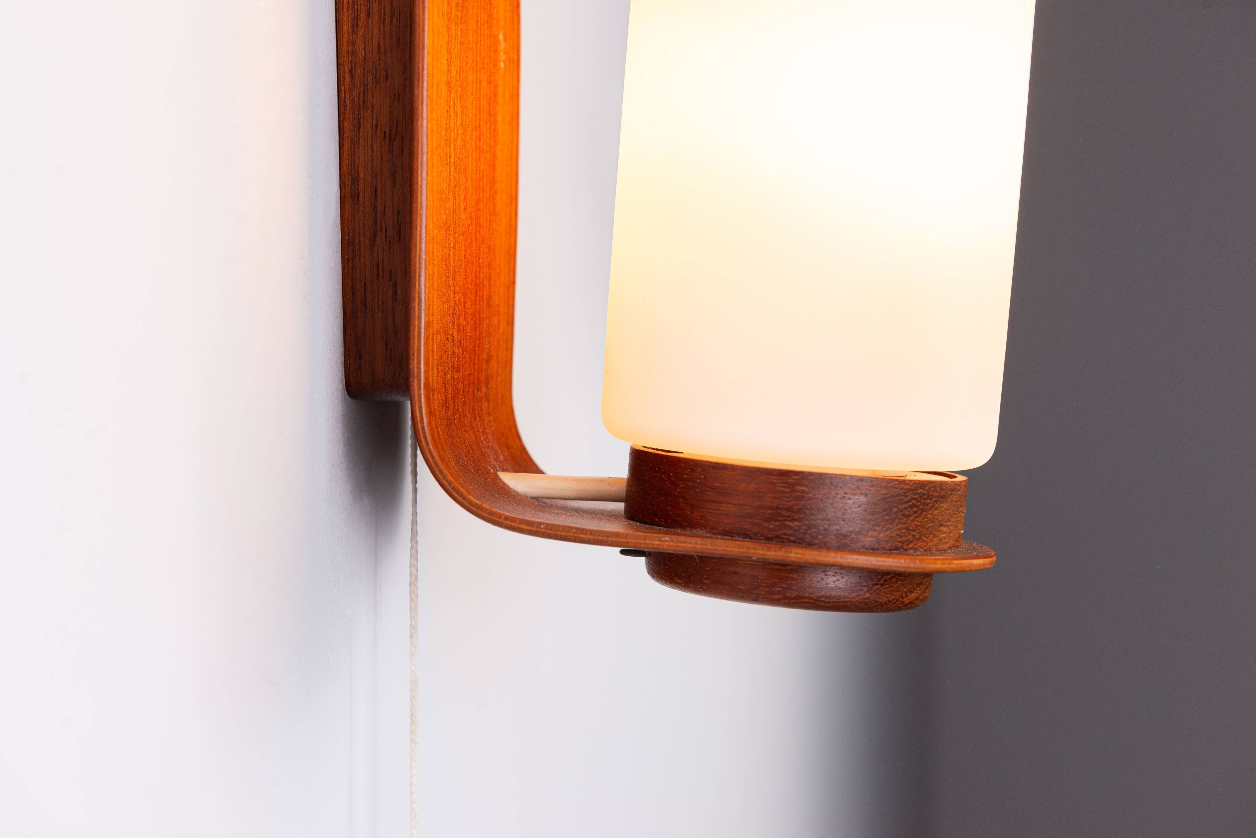 Cilindrical opal glass and bent wood wall lamp