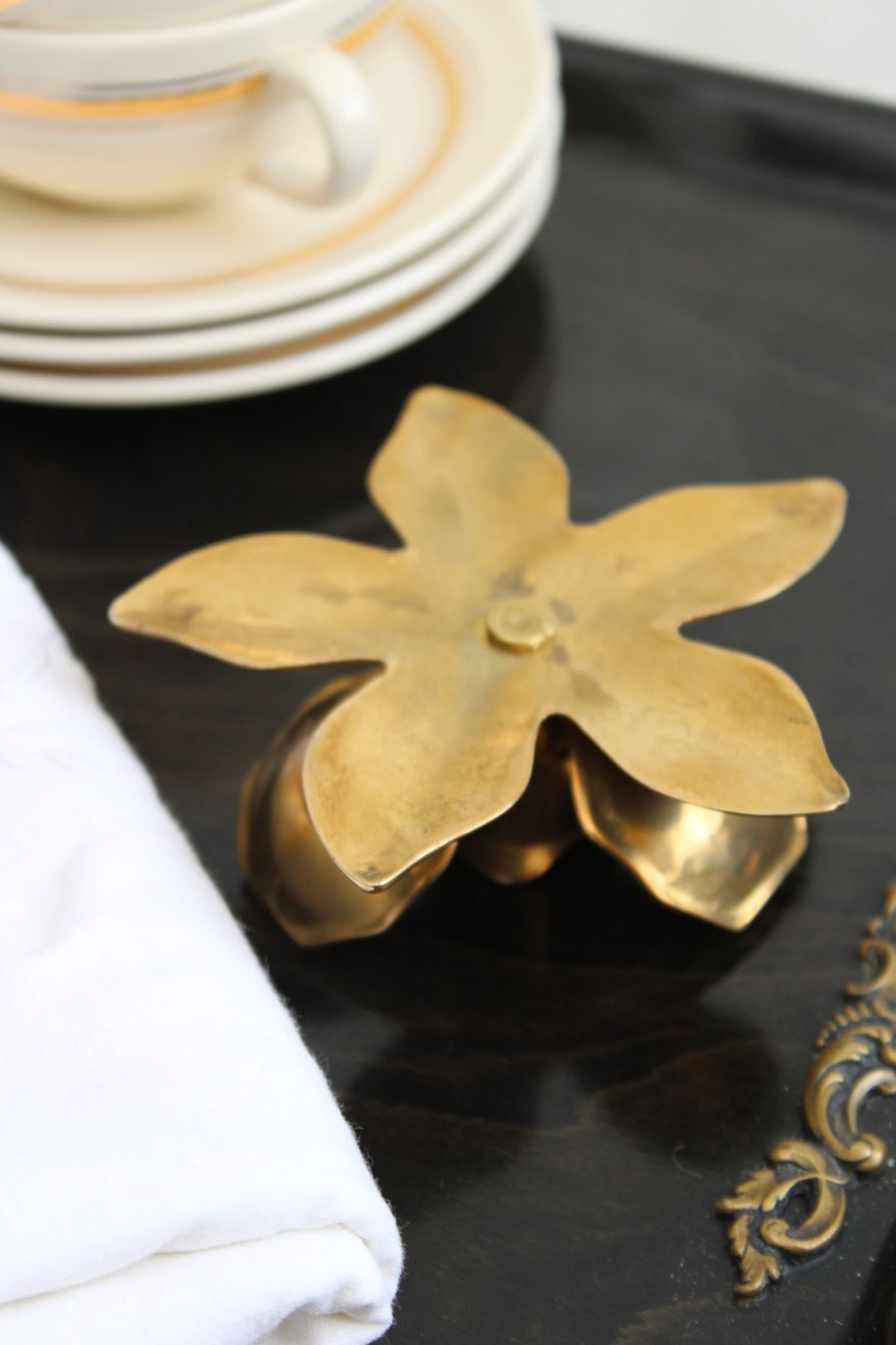 Golden brass candle holder