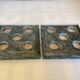 Pair of large green marble candlesticks