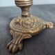 Pair of antique candlesticks in cherub bronze