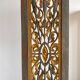Rectangular Indonesian construction element with blue and yellow plant in carved wood