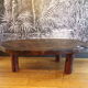 Table basse brutaliste en bois massif