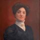 Old painting, portrait of a woman from the early 20th century.
