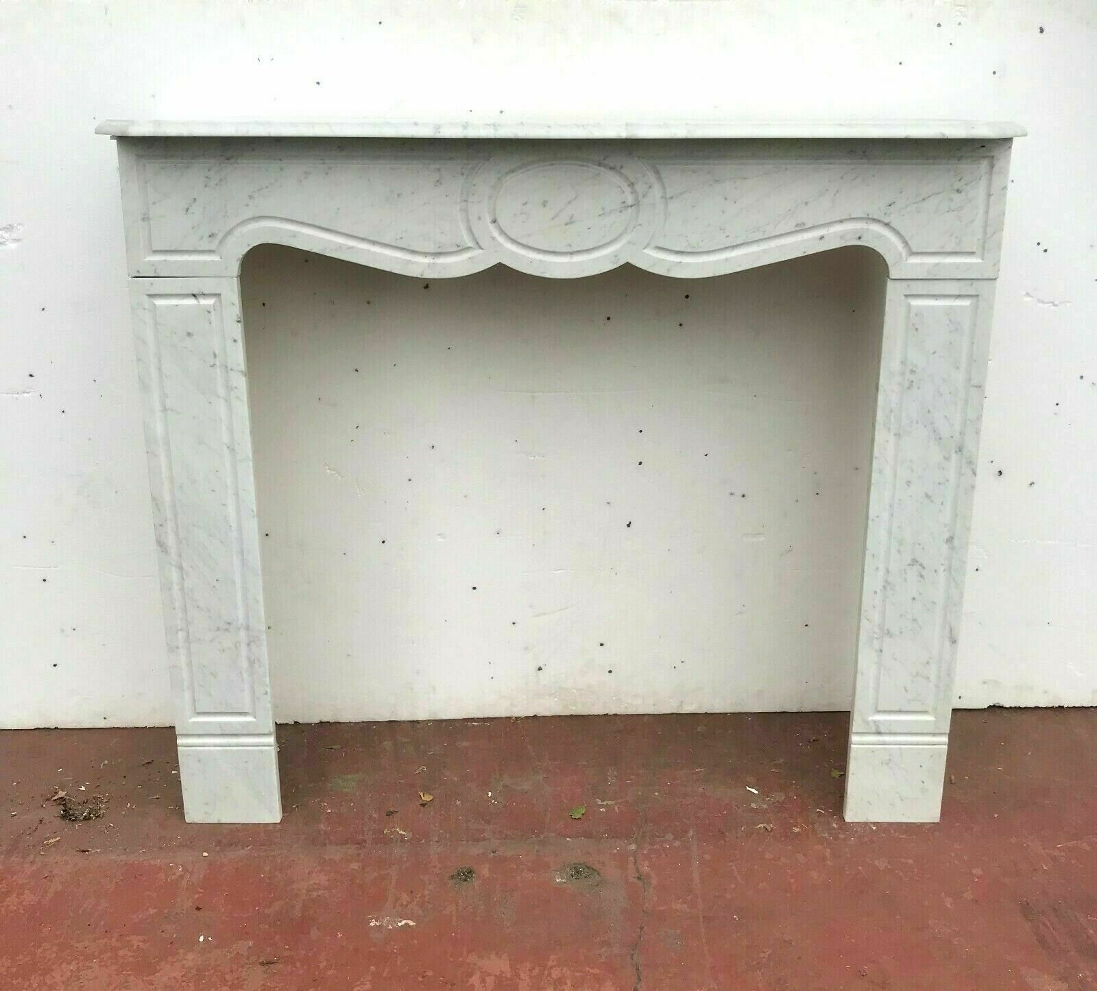 Veined white marble fireplace "model Pompadour a right jambage"