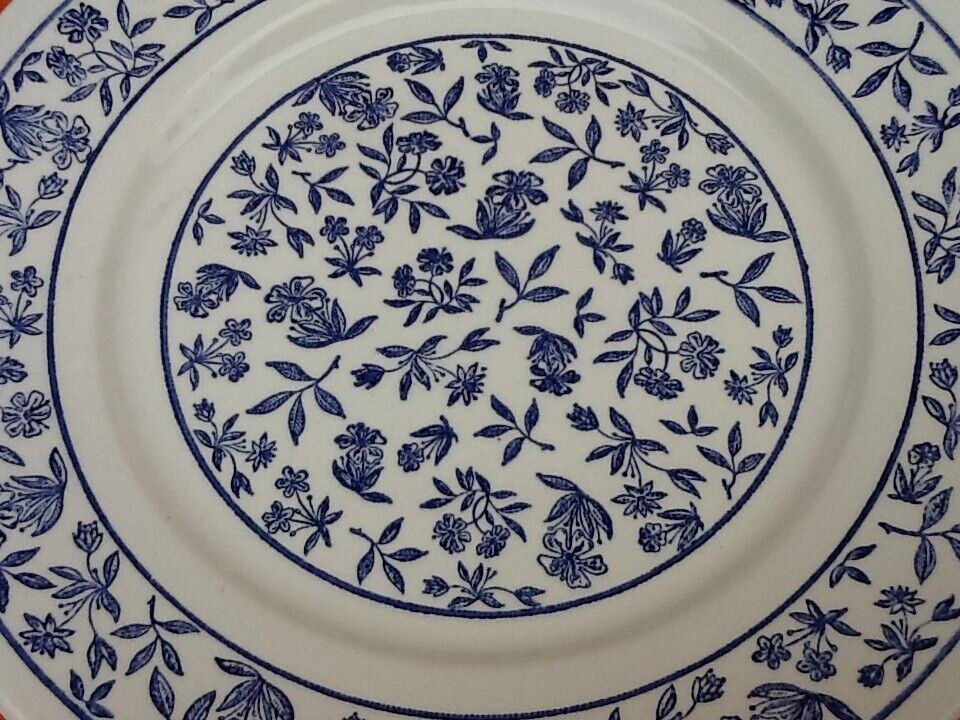8 flat earthenware plates with floral decoration made in italy