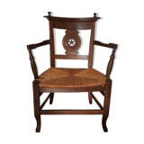 Straw armchair folk art.