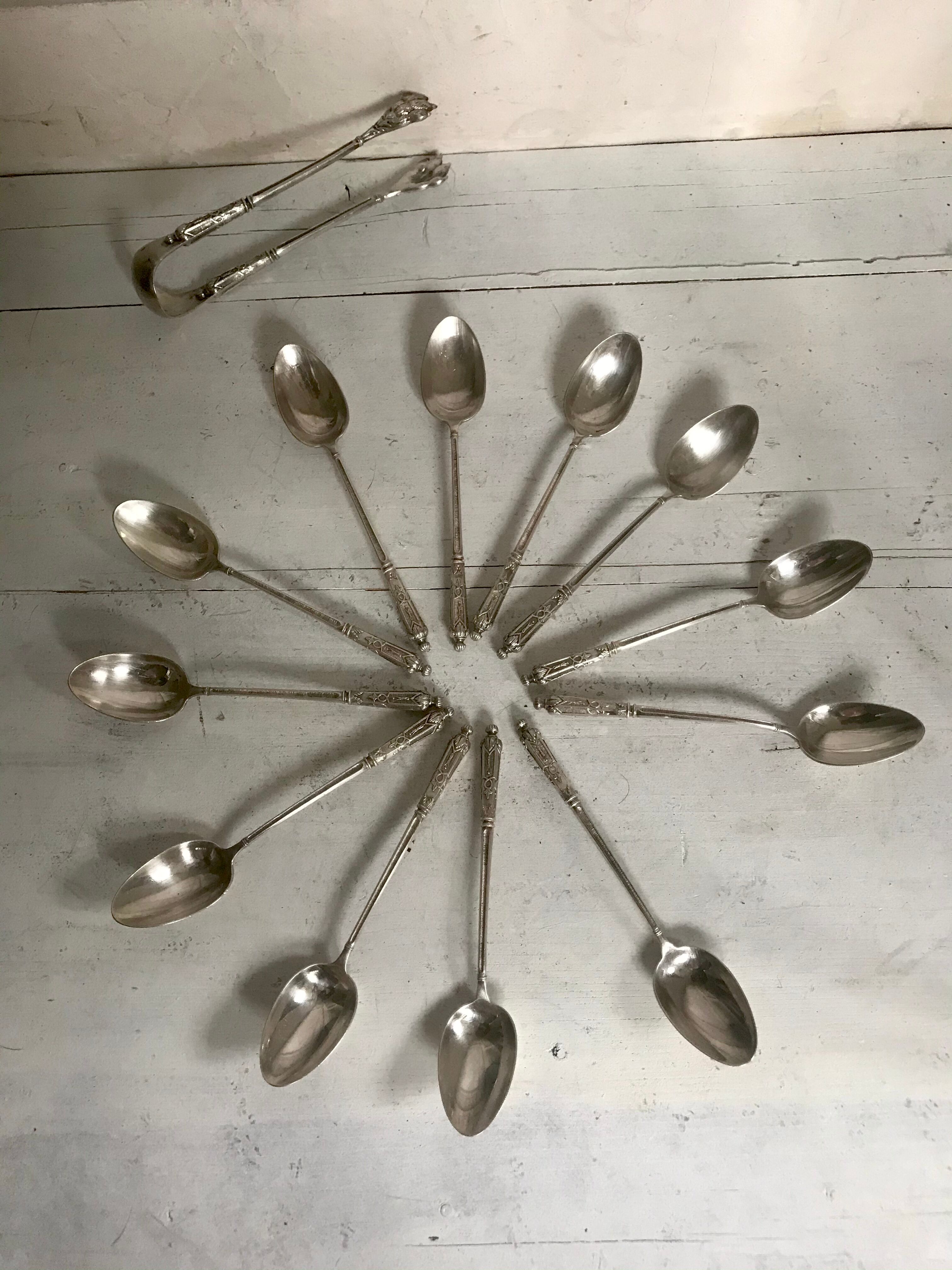 12 teaspoons silver metal