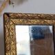 Antique mirror in gilded wood