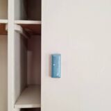 Old white medicine cabinet