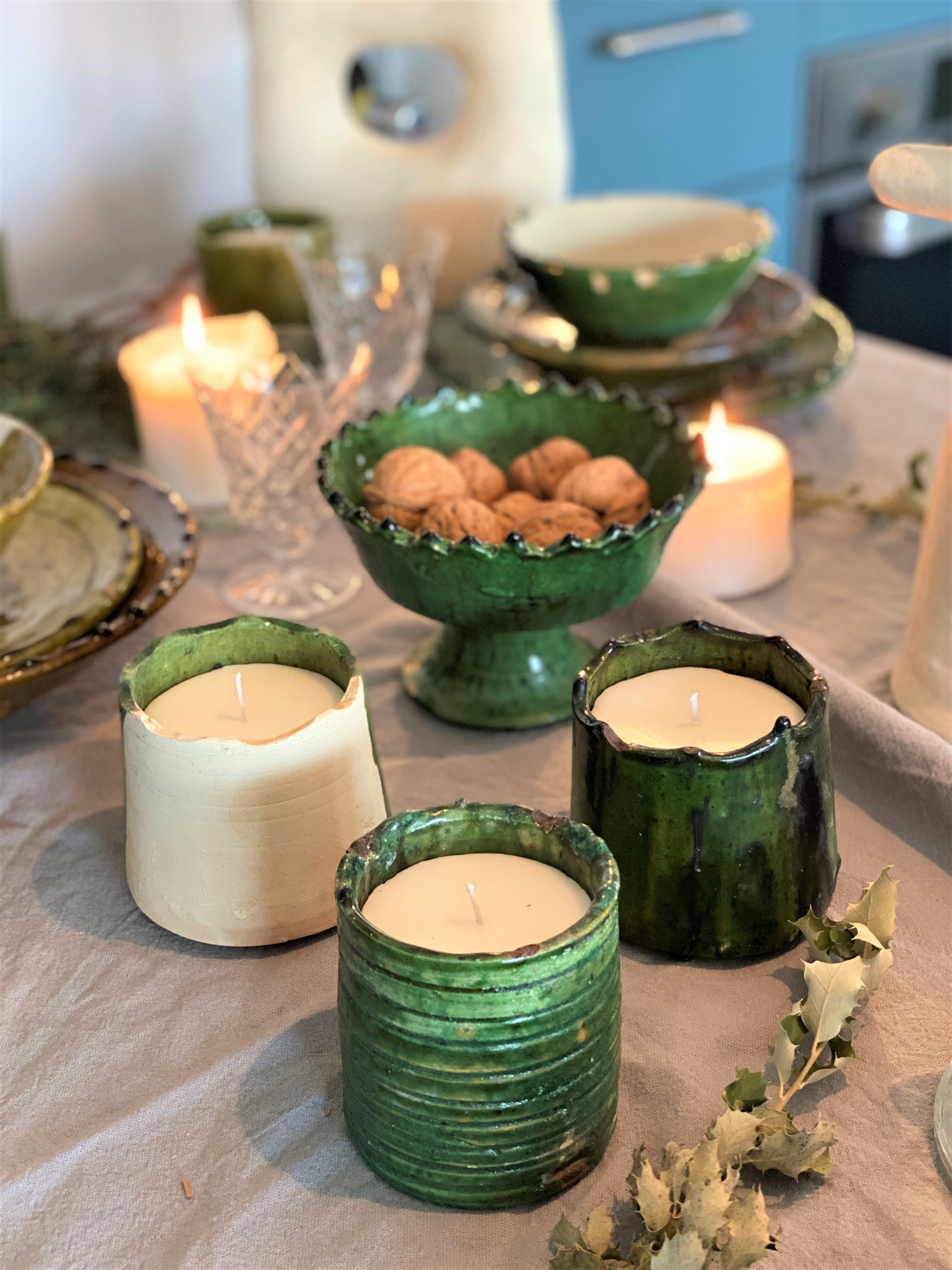 Candle placed in terracotta pottery