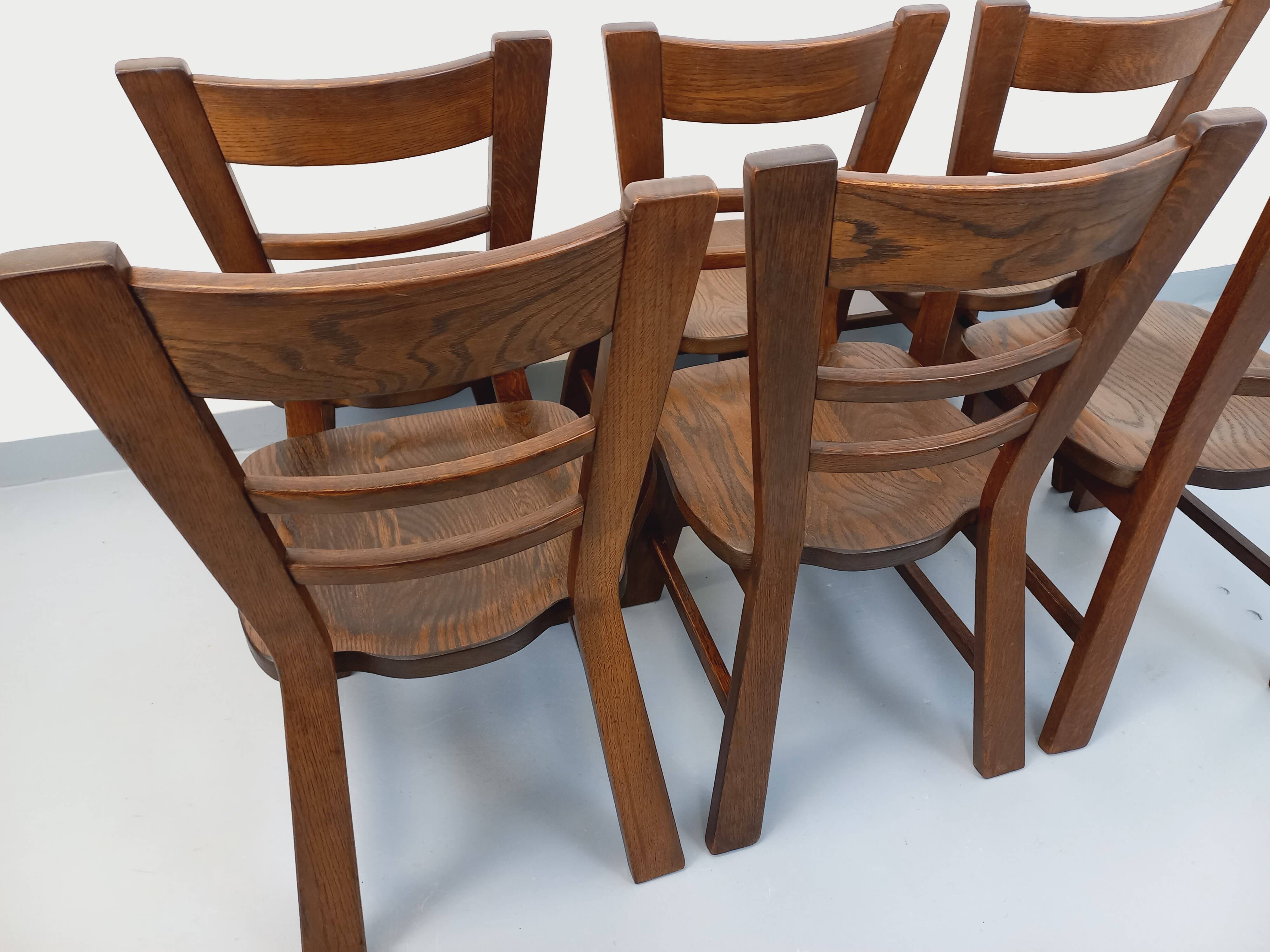 Set of 6 vintage brutalist oak chairs from the 1950s.