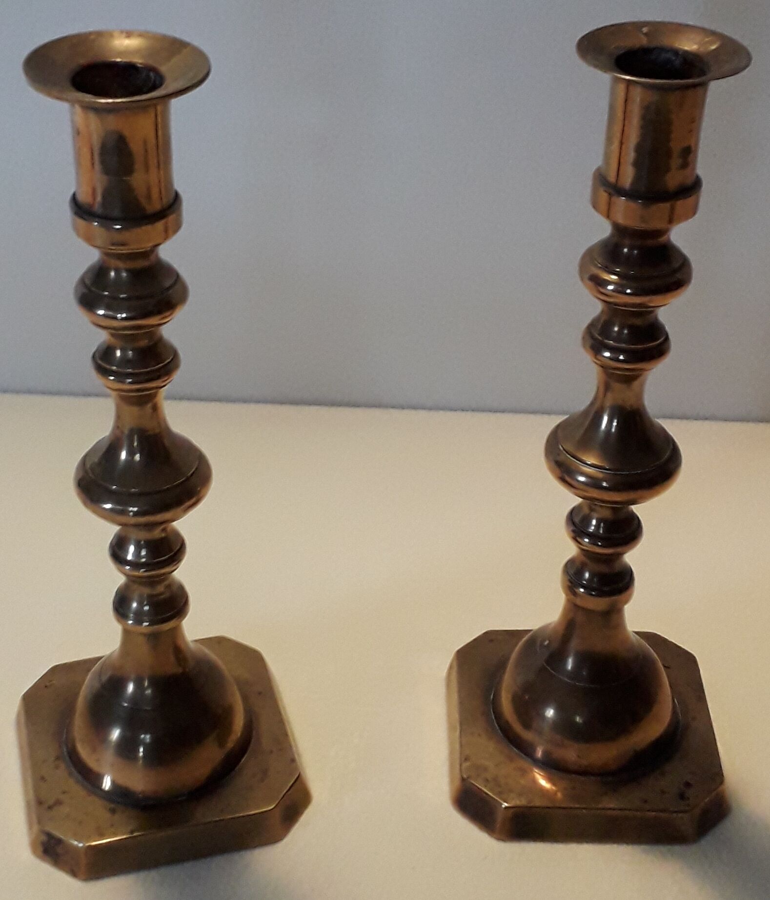 Duo of brass candle holders