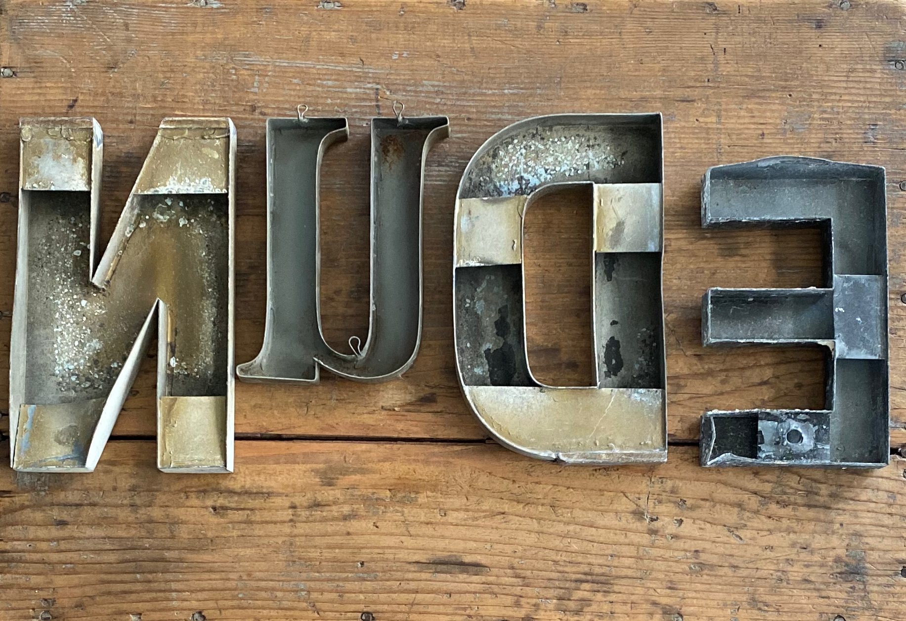 Nude sign letters