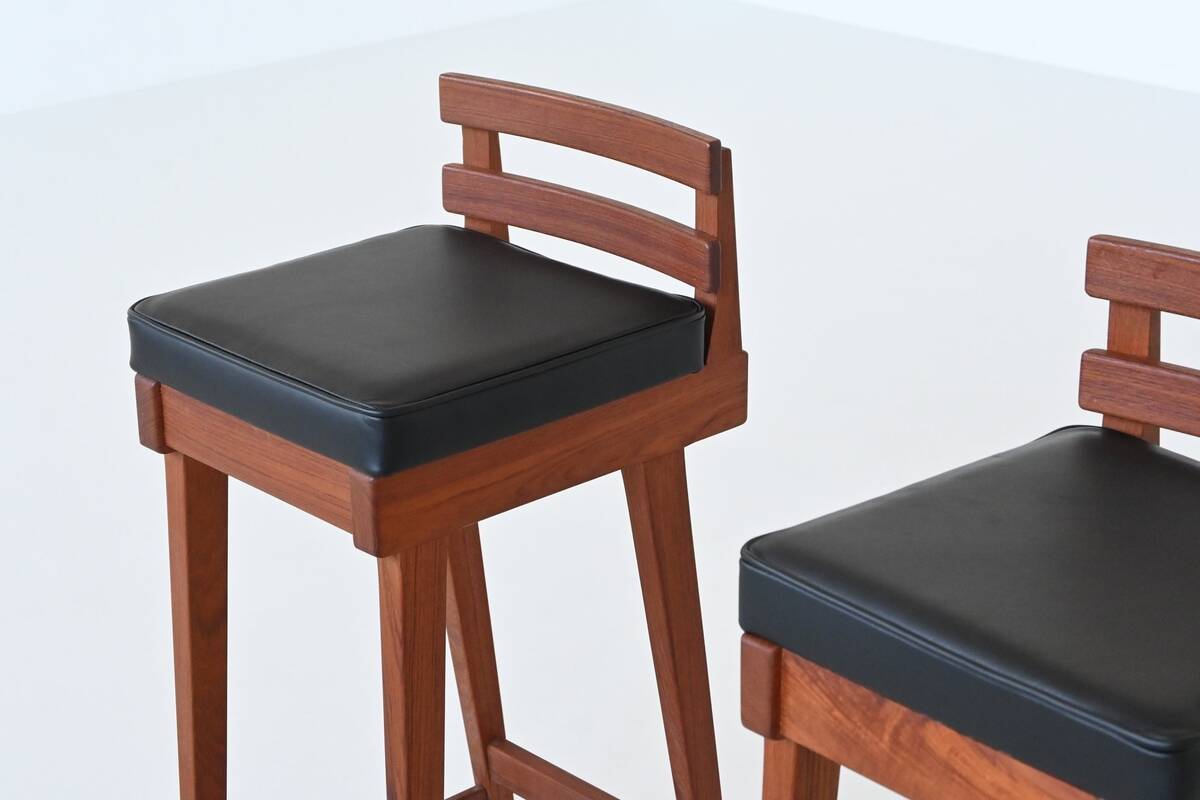 Erik Buck set of three bar stools in teak and leather Dyrlund Denmark 1960