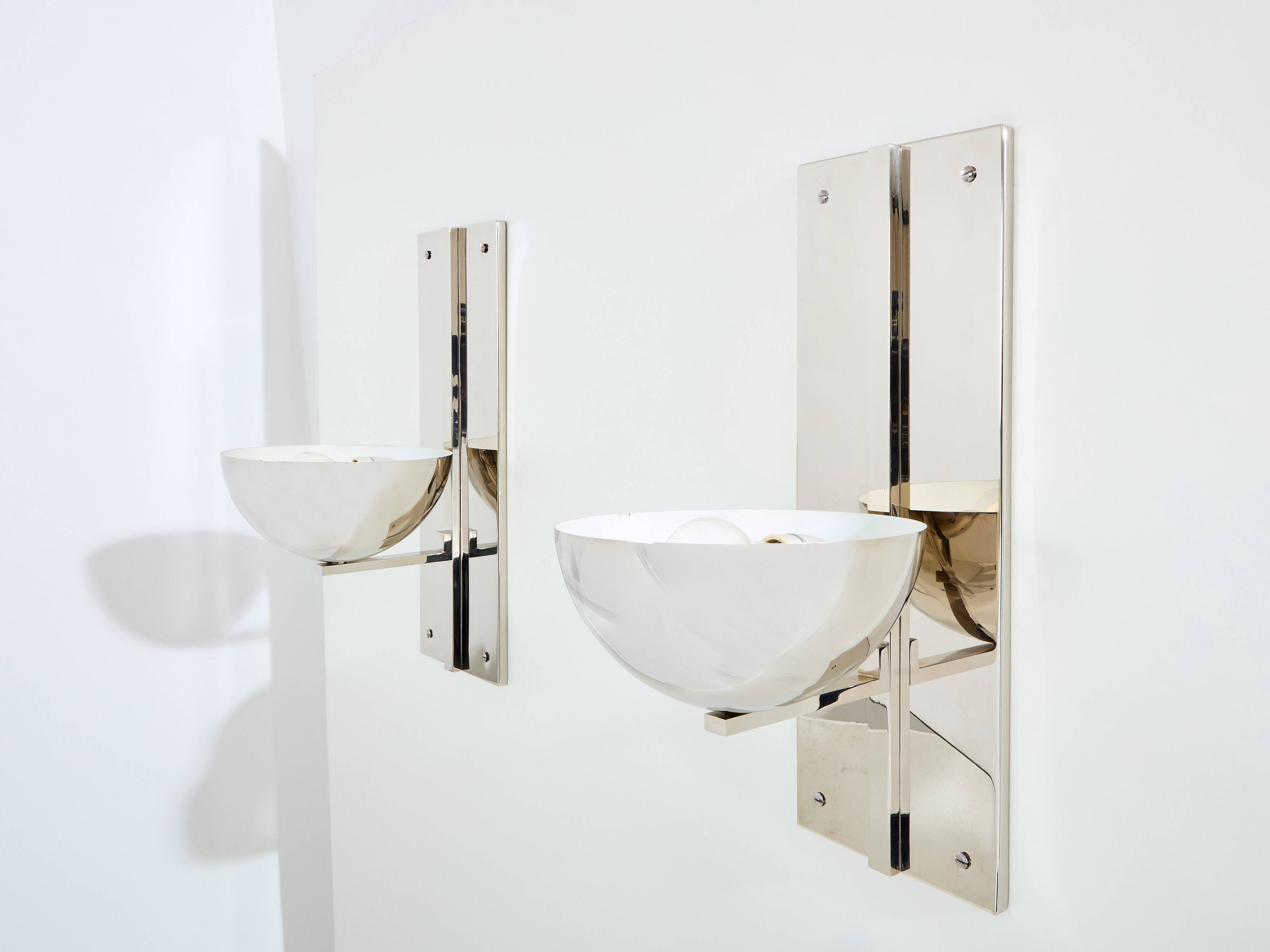 Pair of modernist wall lights by Claude Parent, nickel-plated steel, 1992.