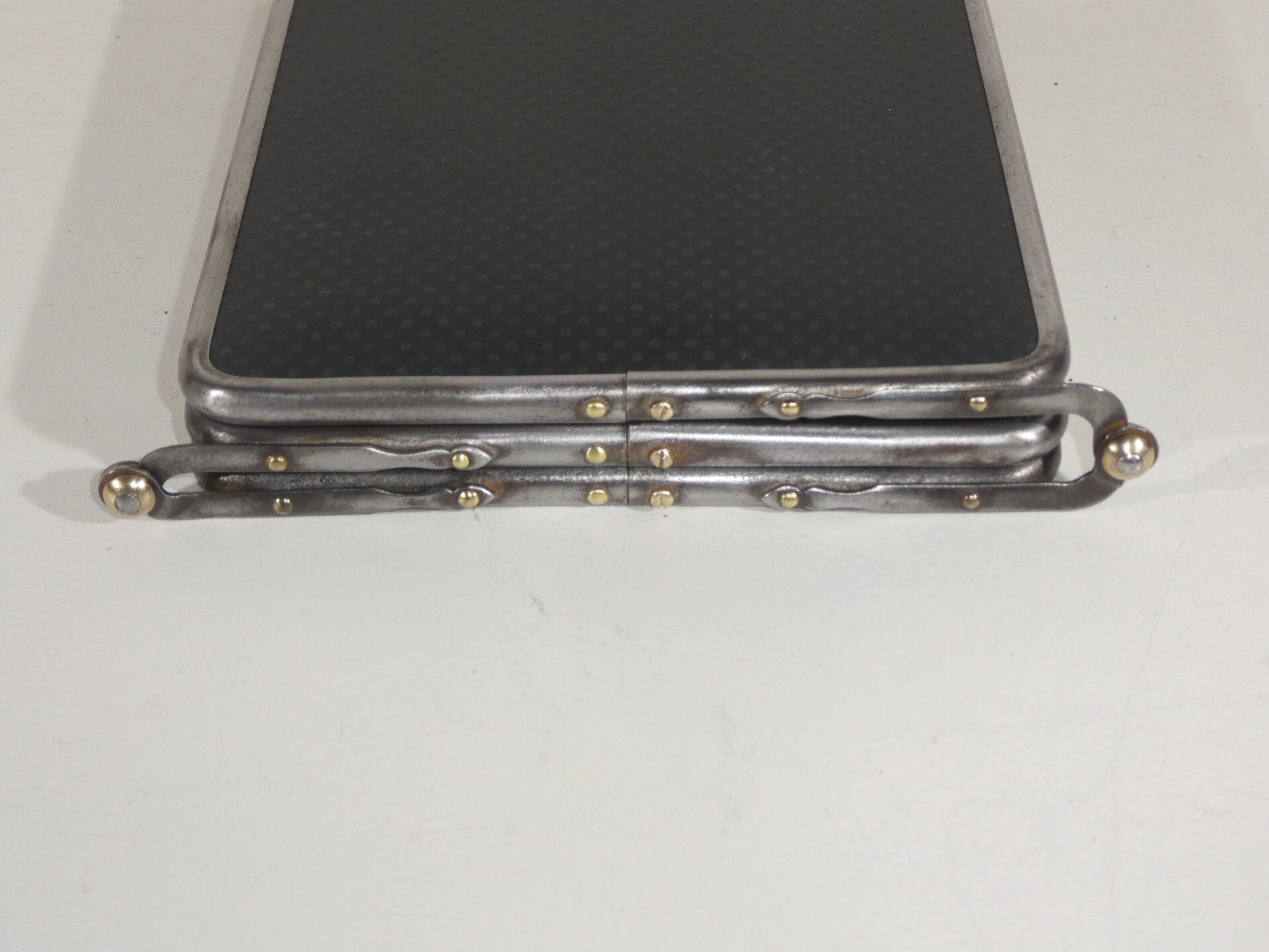 Tryptic barber's mirror