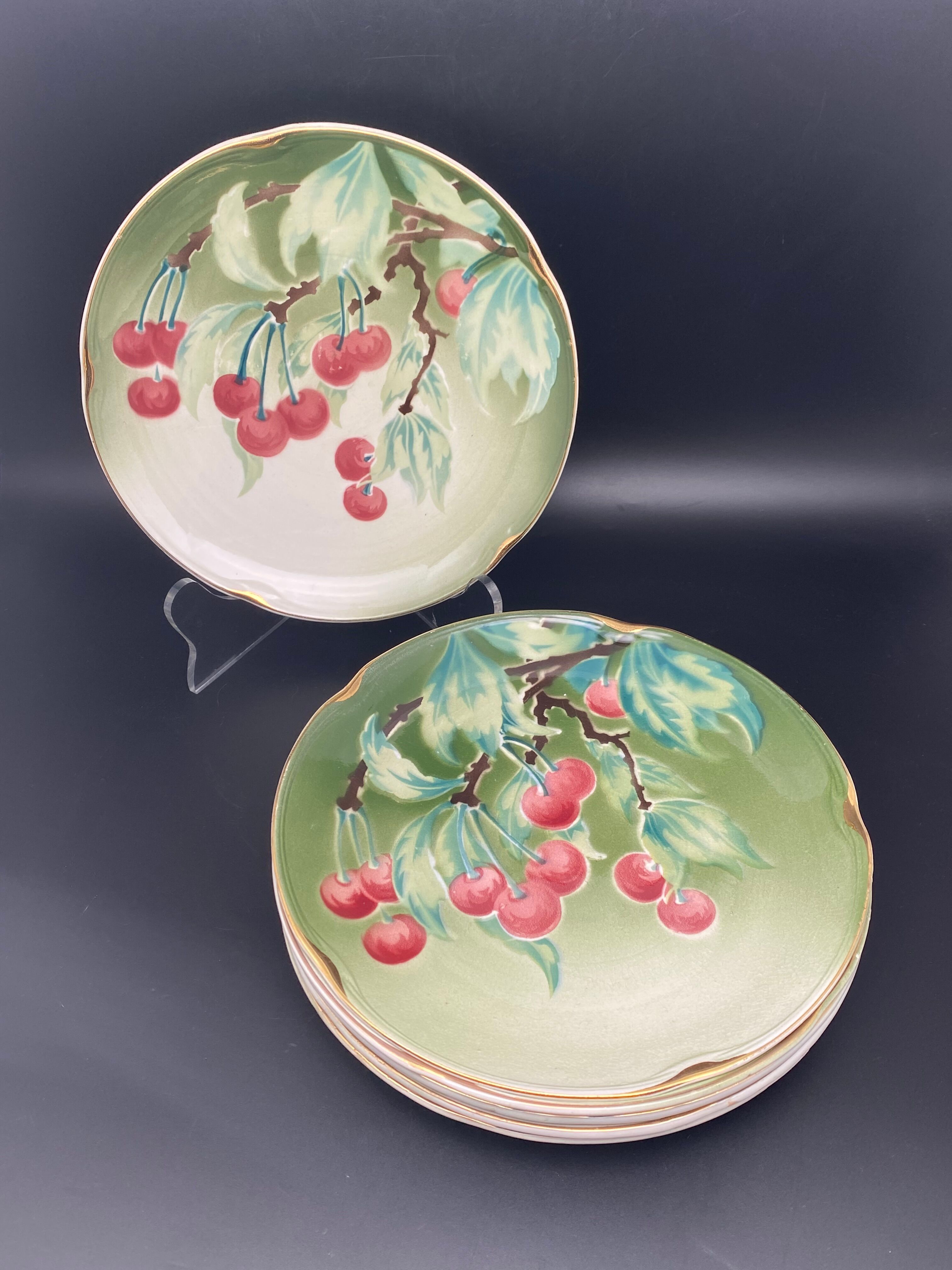 Lunéville cherry plates with golden edges