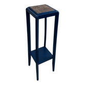 Blue side table with a veined stone top and a low shelf in the Art Deco style.