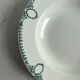 Céranord Saint Amand deep plate with green crown decoration.