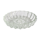 Empty pockets in chiseled glass