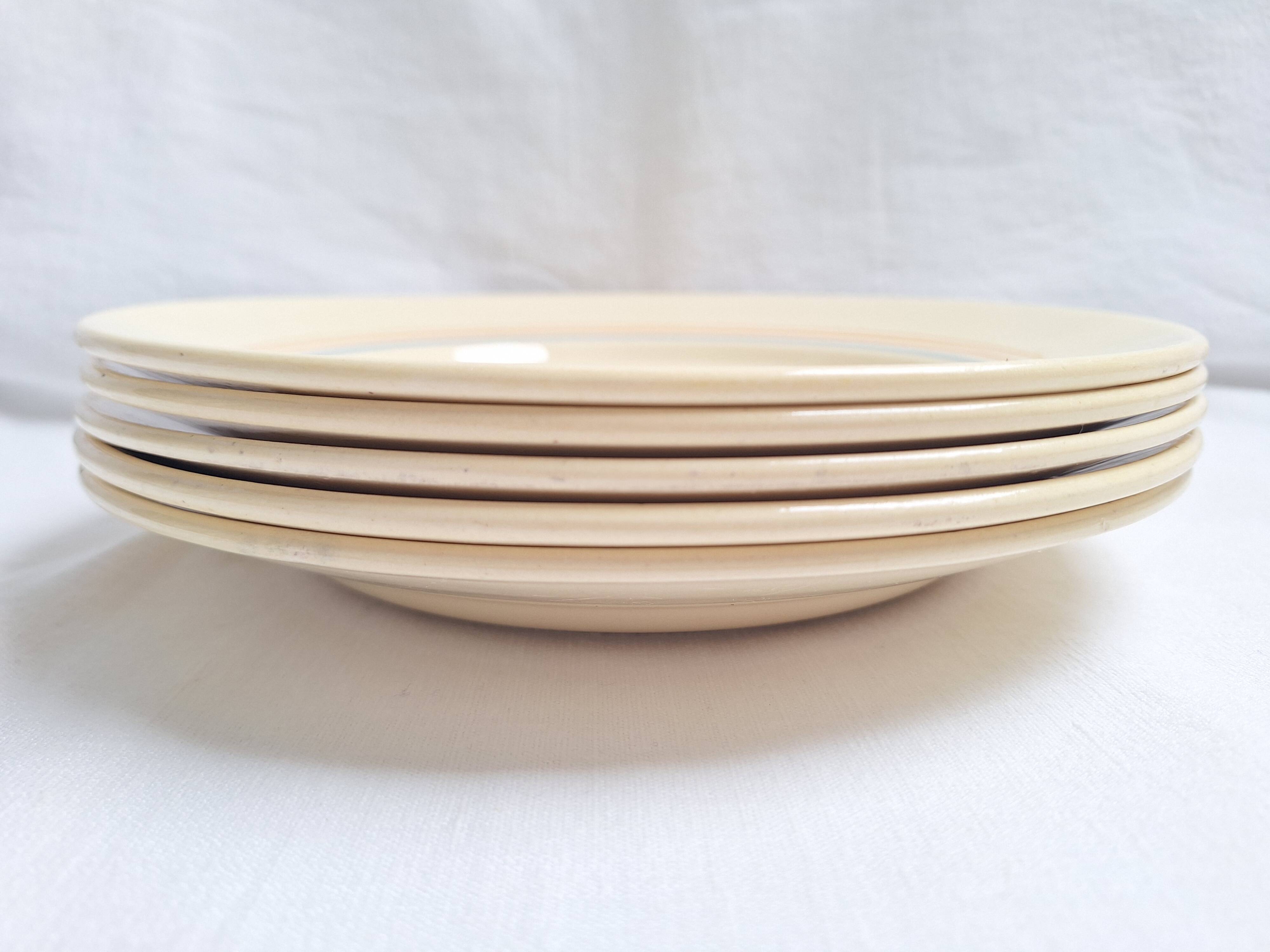 Vintage cream, orange and blue dinner plates.