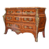 Tomb-shaped commode in Louis XV style with decoration featuring Spanish figures.