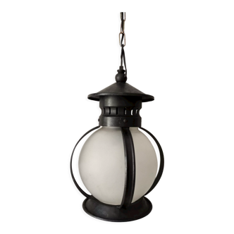 Old globe pendant lamp in opaque glass and black wrought iron