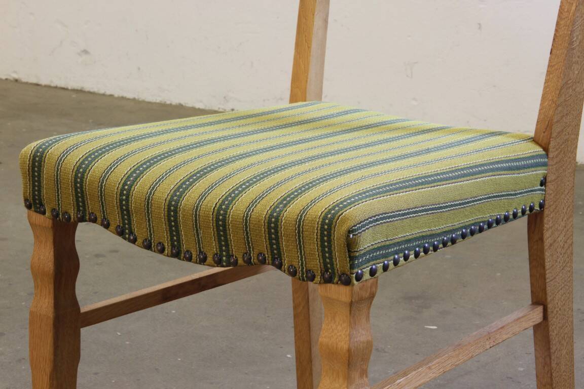 Vintage 1960s brutalist Danish modern oak dining chairs in the style of Henning Kjærnulf