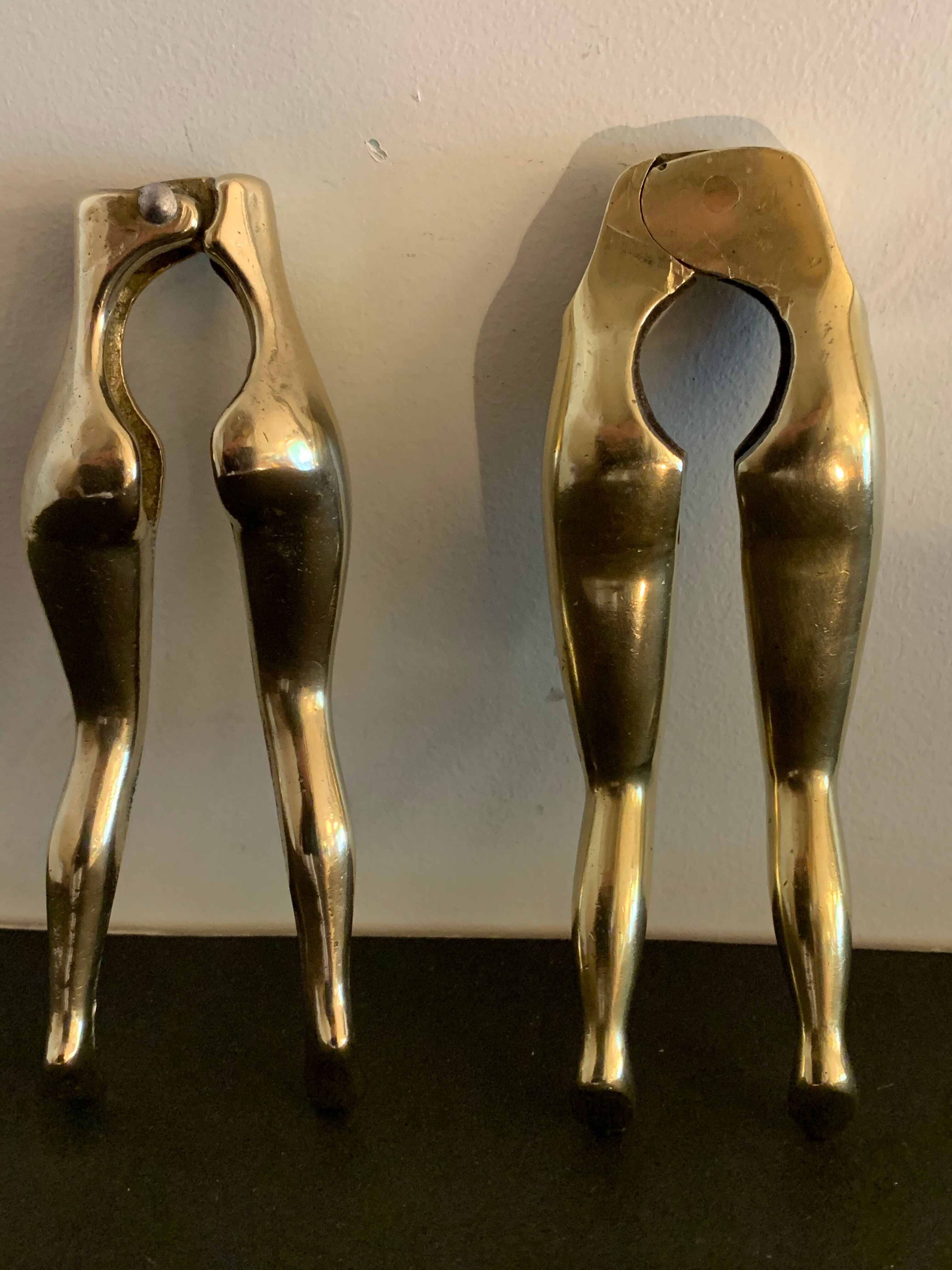 Pair of nutcrackers or anthropomorphic hazelnuts in bronze