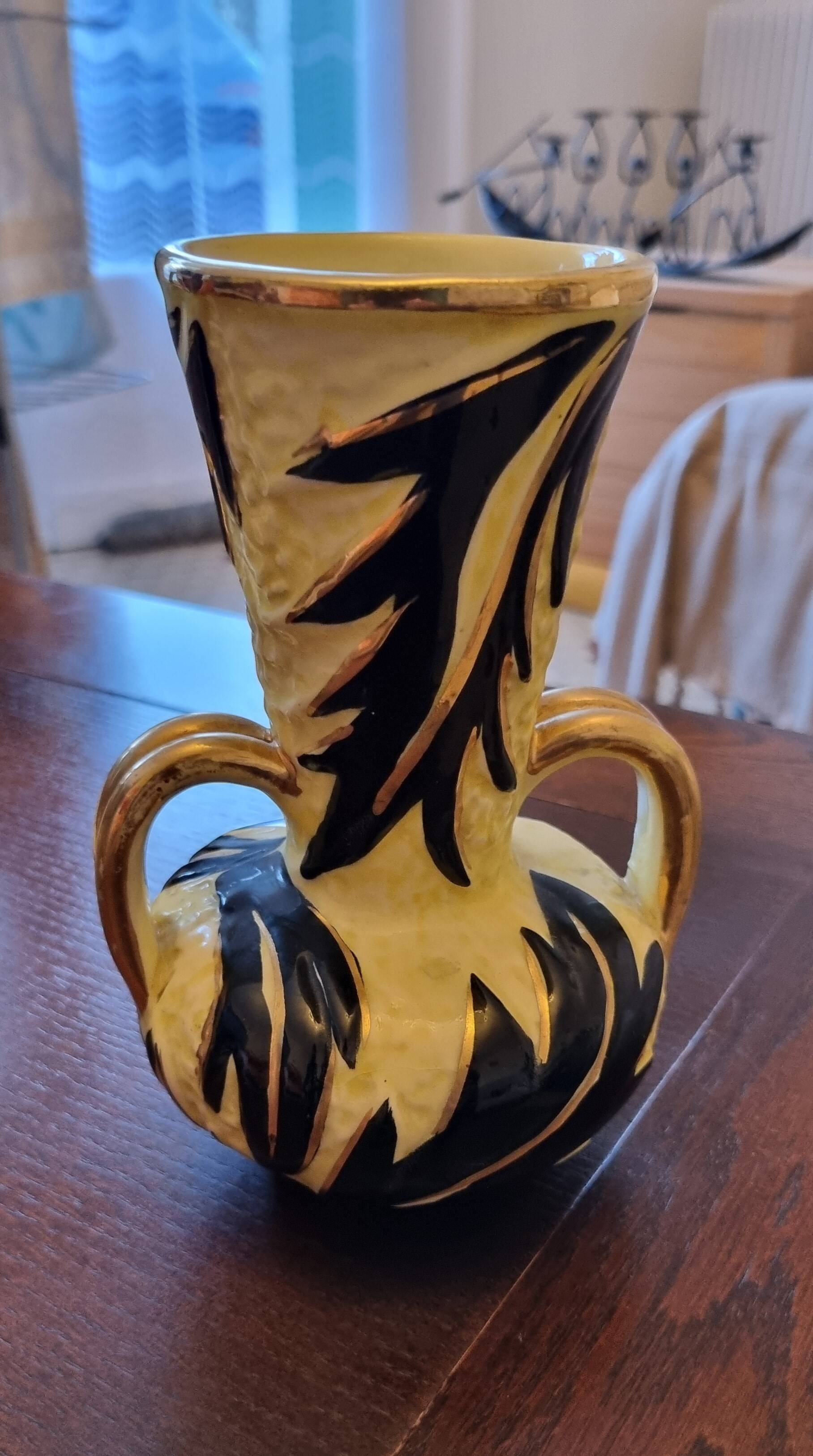 Set of 4 vases in earthenware and terracotta.