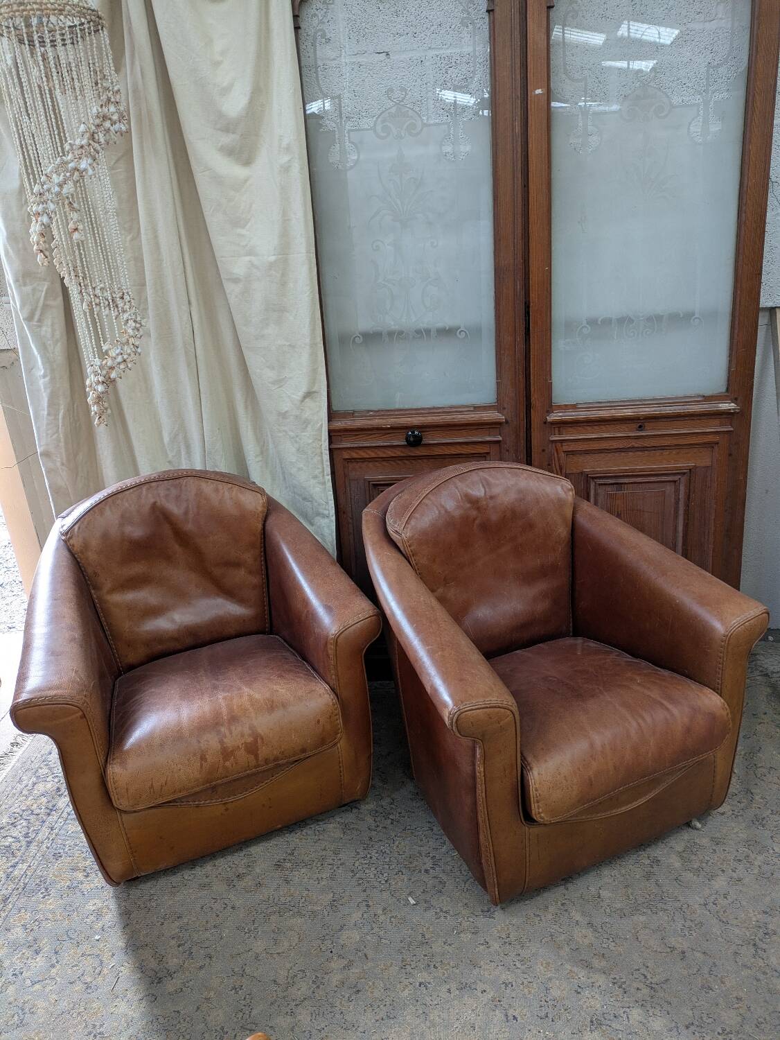 Pair of leather armchairs