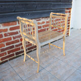 Antique Napoleon III piano bench in wood and cane.