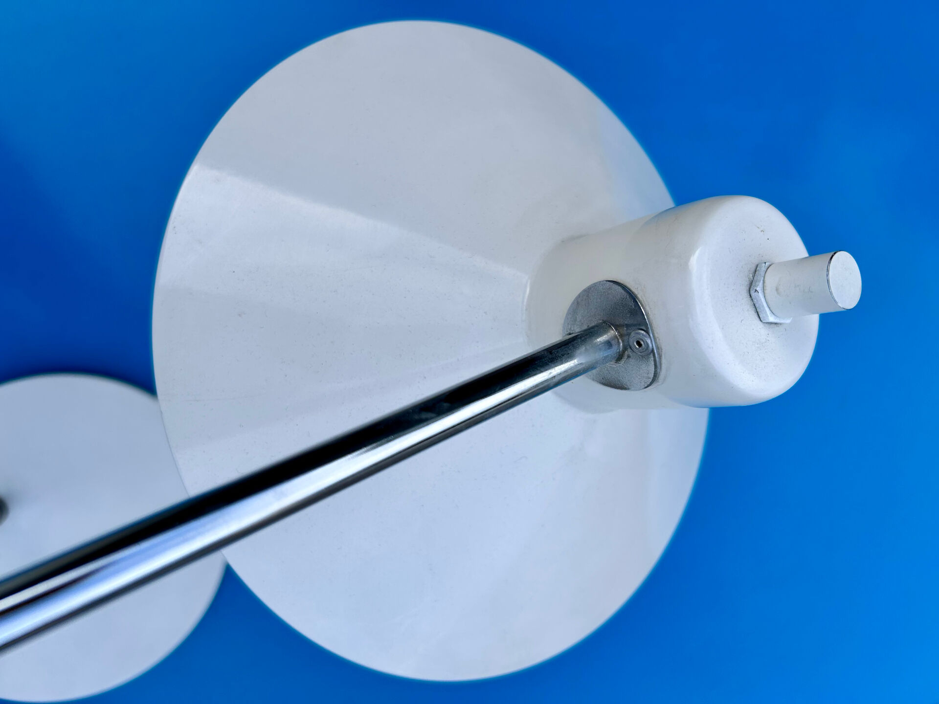 Articulated lamp in white colour.