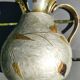 Decorative decanter in solid enamelled brass