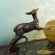 Art deco table lamp, marble, opaque glass and granite, animal in bronze patinated regulator