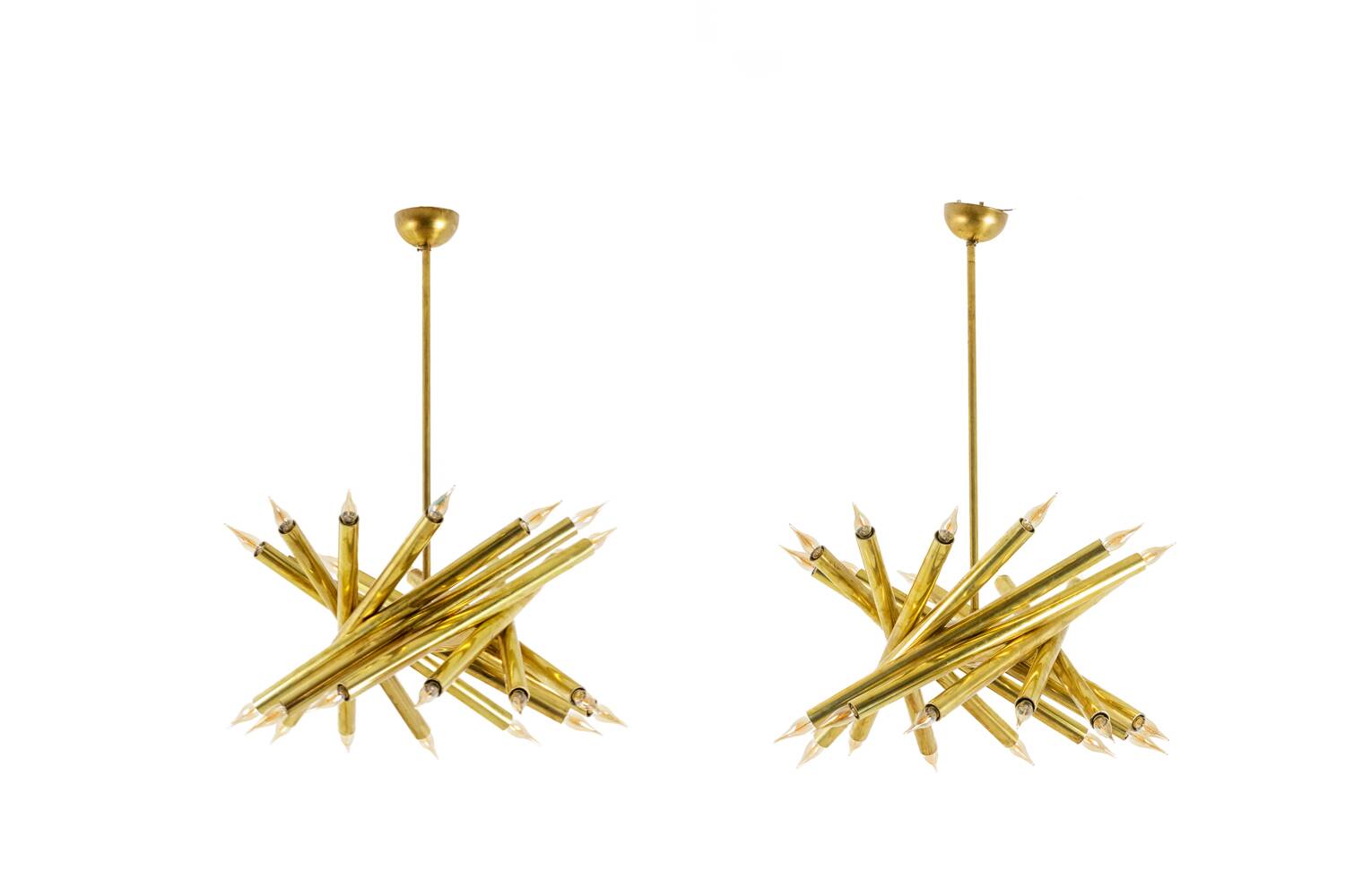 Pair of 24-light patinated brass chandeliers. 1980s.