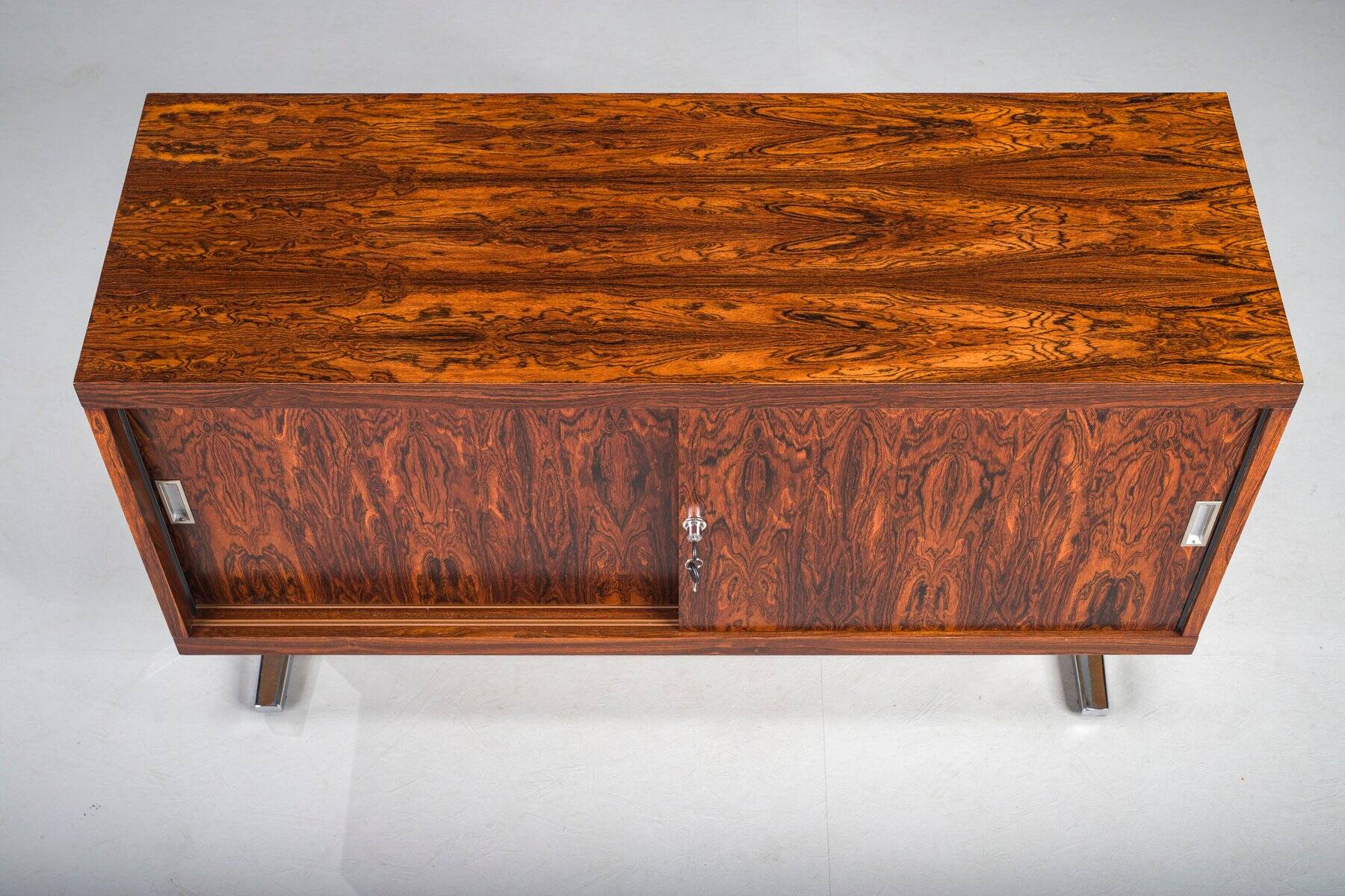 Mid-century wood veneer sideboard with chrome legs, 1960s