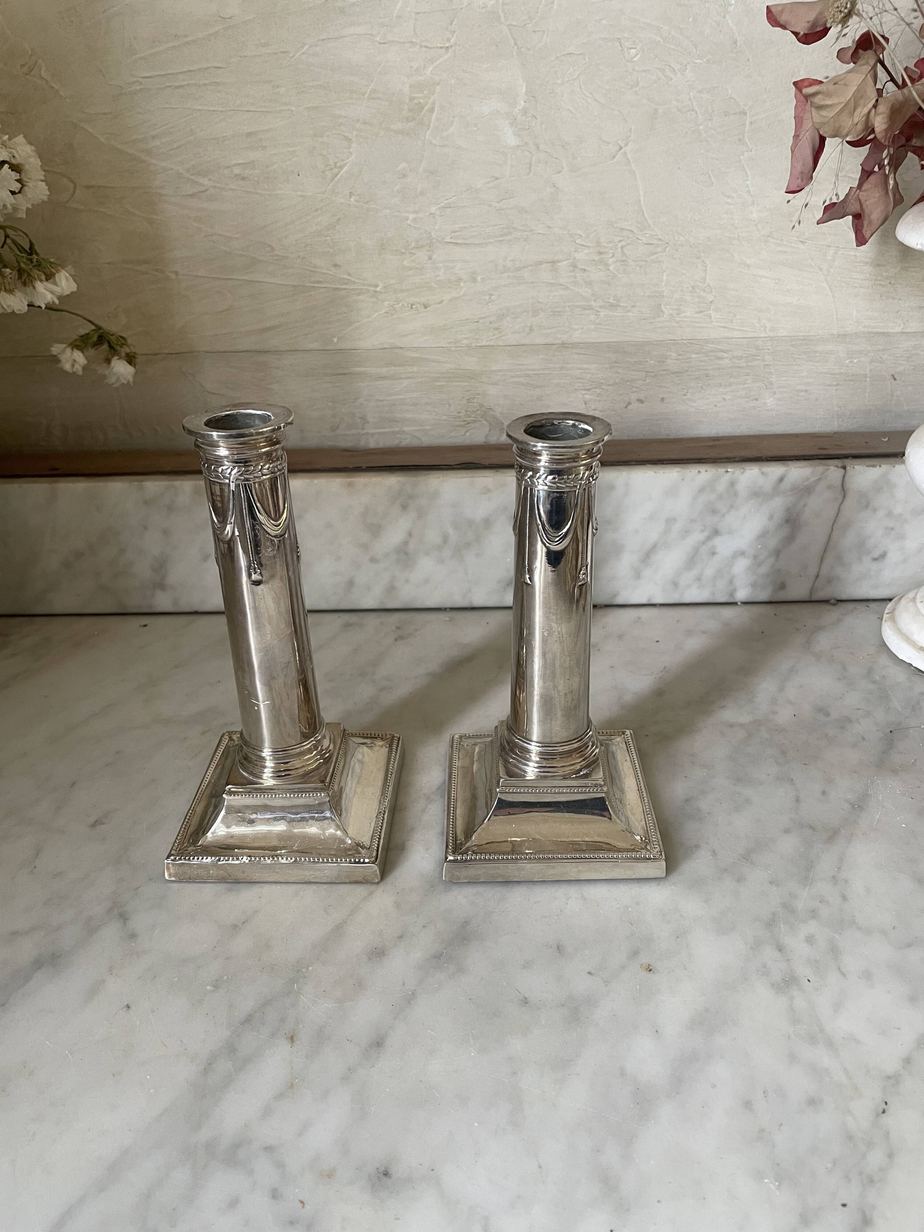 pair of Victorian style silver-plated candlesticks