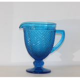 Old table set in blue pressed moulded glass