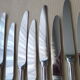 Box of 12 table knives in stainless steel and silver metal