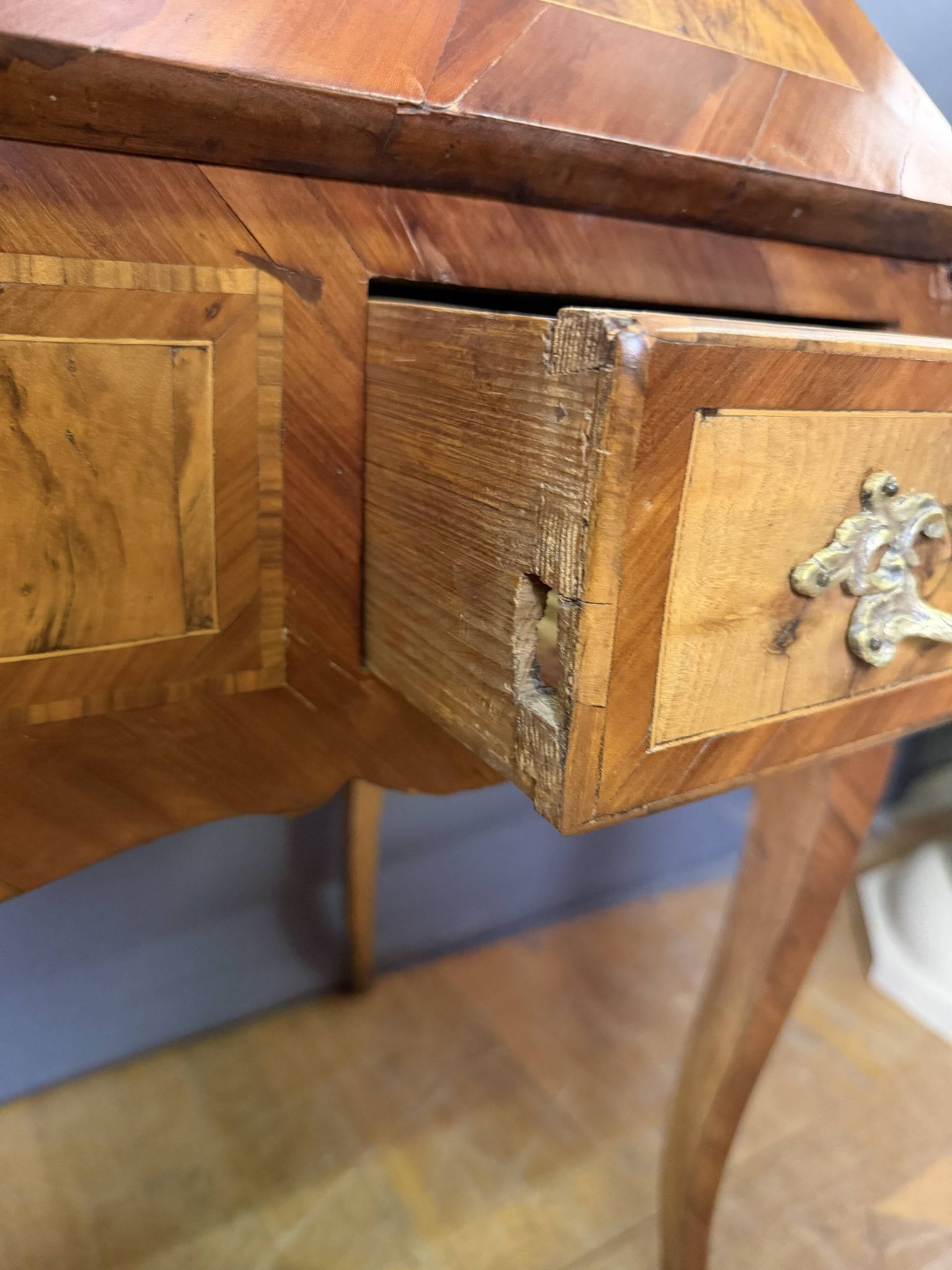 Louis XV slant-top desk in 18th-century marquetry.
