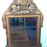 Miroir en bois doré style Louis XVI