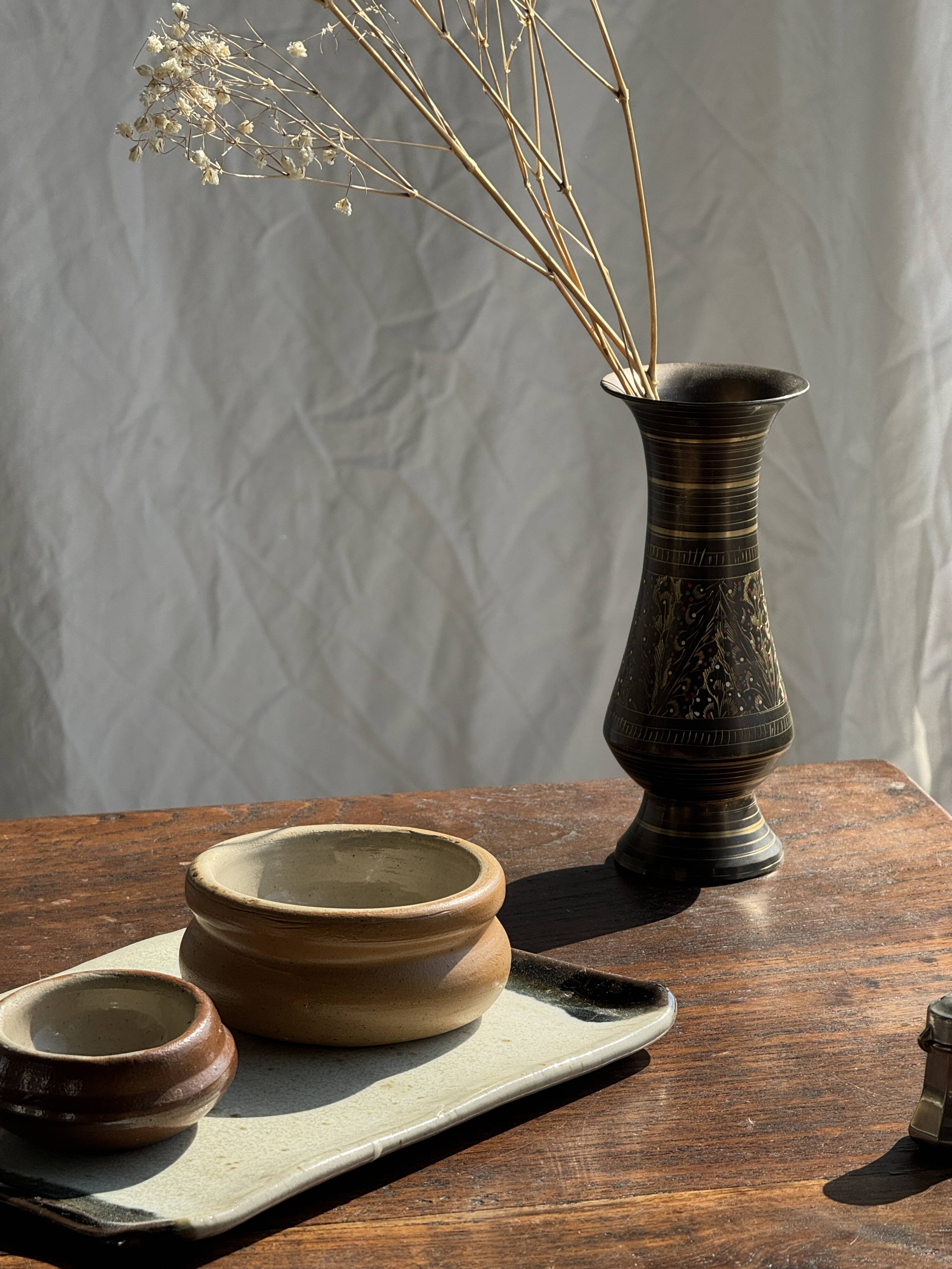Pair of two small chiseled metal vases H15.5 D6.5
