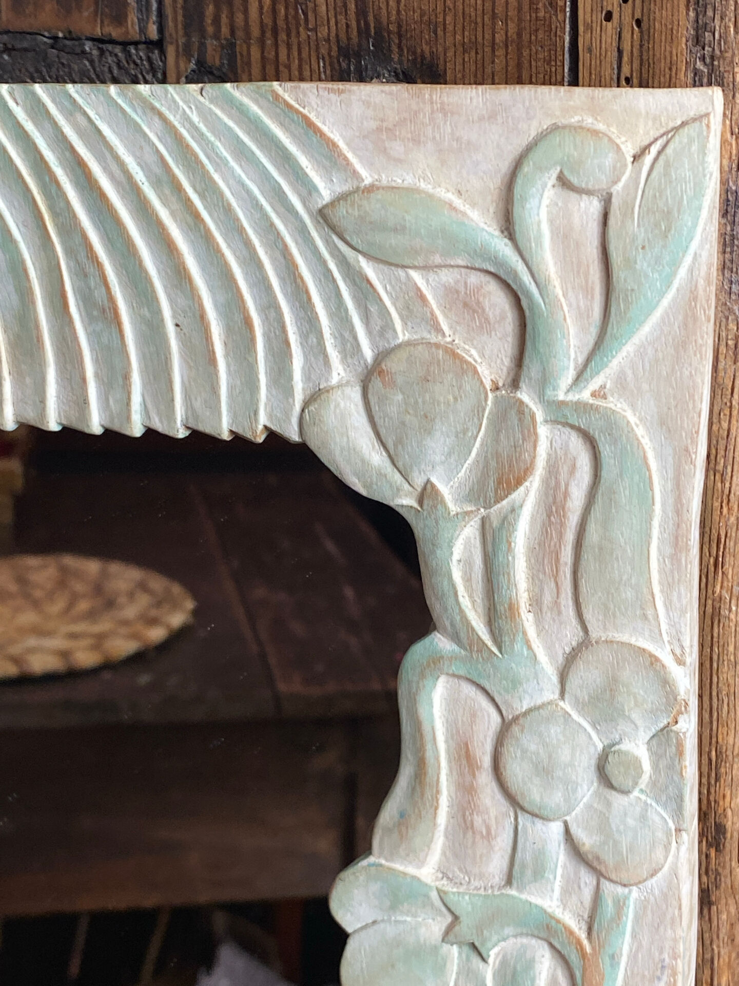 Carved wooden mirror