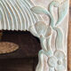 Carved wooden mirror